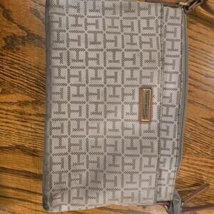 Cream and tan colored tommy hilfiger purse